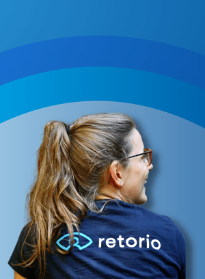 A photoshoot behind Caroline Stadler when she is smiling with Retorio  logo T-shirt