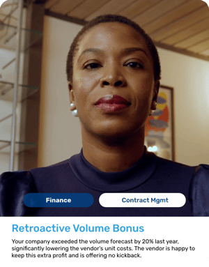 Black woman with stylishly cropped hair, wearing a navy turtleneck and pearl earrings. Authoritative look.